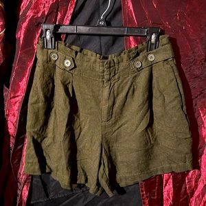 Really cute women's size small army green dress shorts really stretchy!